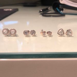 set of four geometric earrings